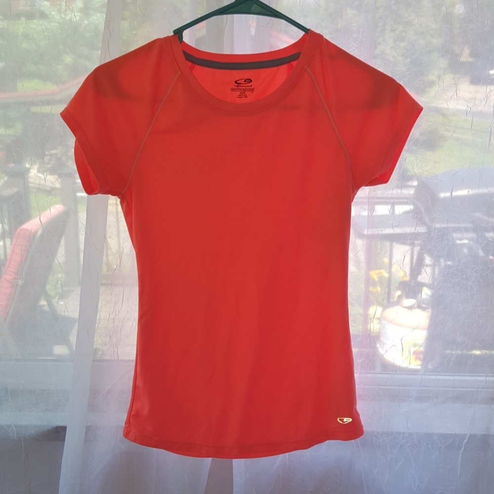 Florescent orange work out gear shirt